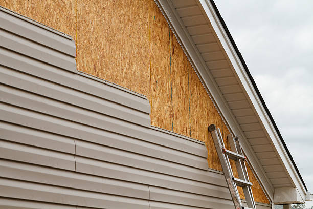 Professional Siding Contractor technician working in Moxahala, OH